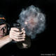 Illustration for article titled High-speed photos turn violent gun explosions into delicate stills
